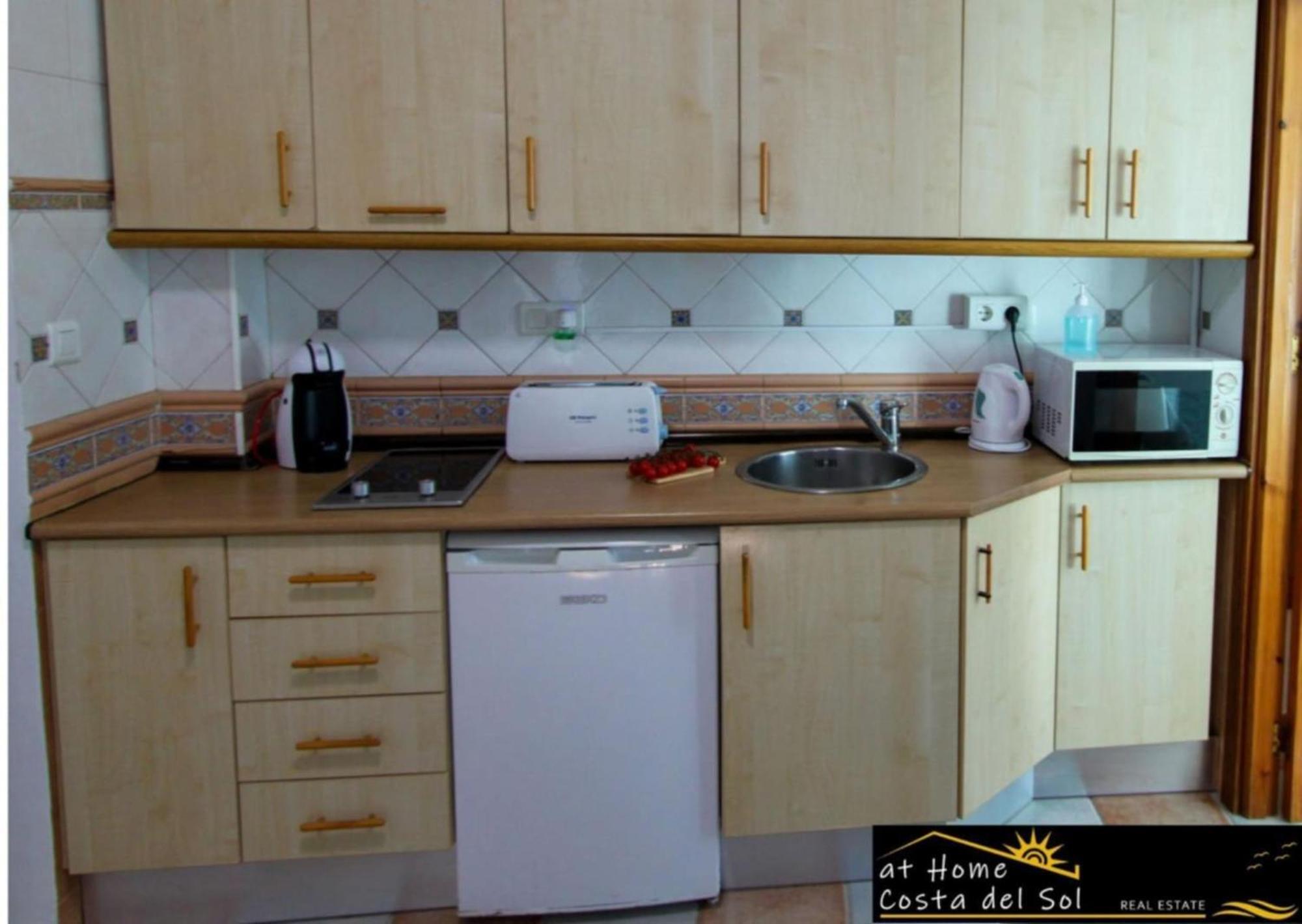 En El Centro De By At Costa Del Sol Apartment